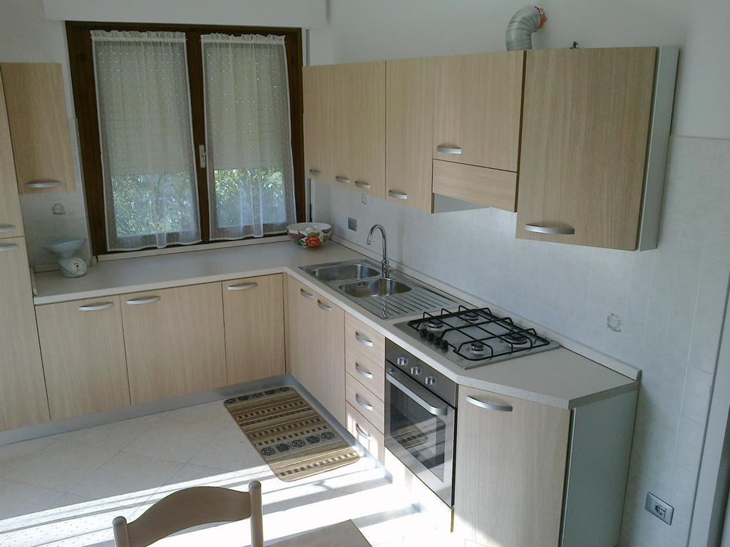 Casa Ferrari Monica Apartment Калчераника ал Лаго Стая снимка